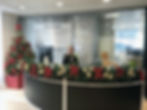 Beautiful Christmas tree and decorations at the front desk in office