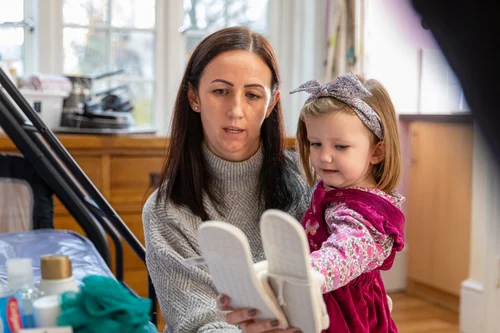 Carolyn and her family share an emotional moment captured for the charity campaign
