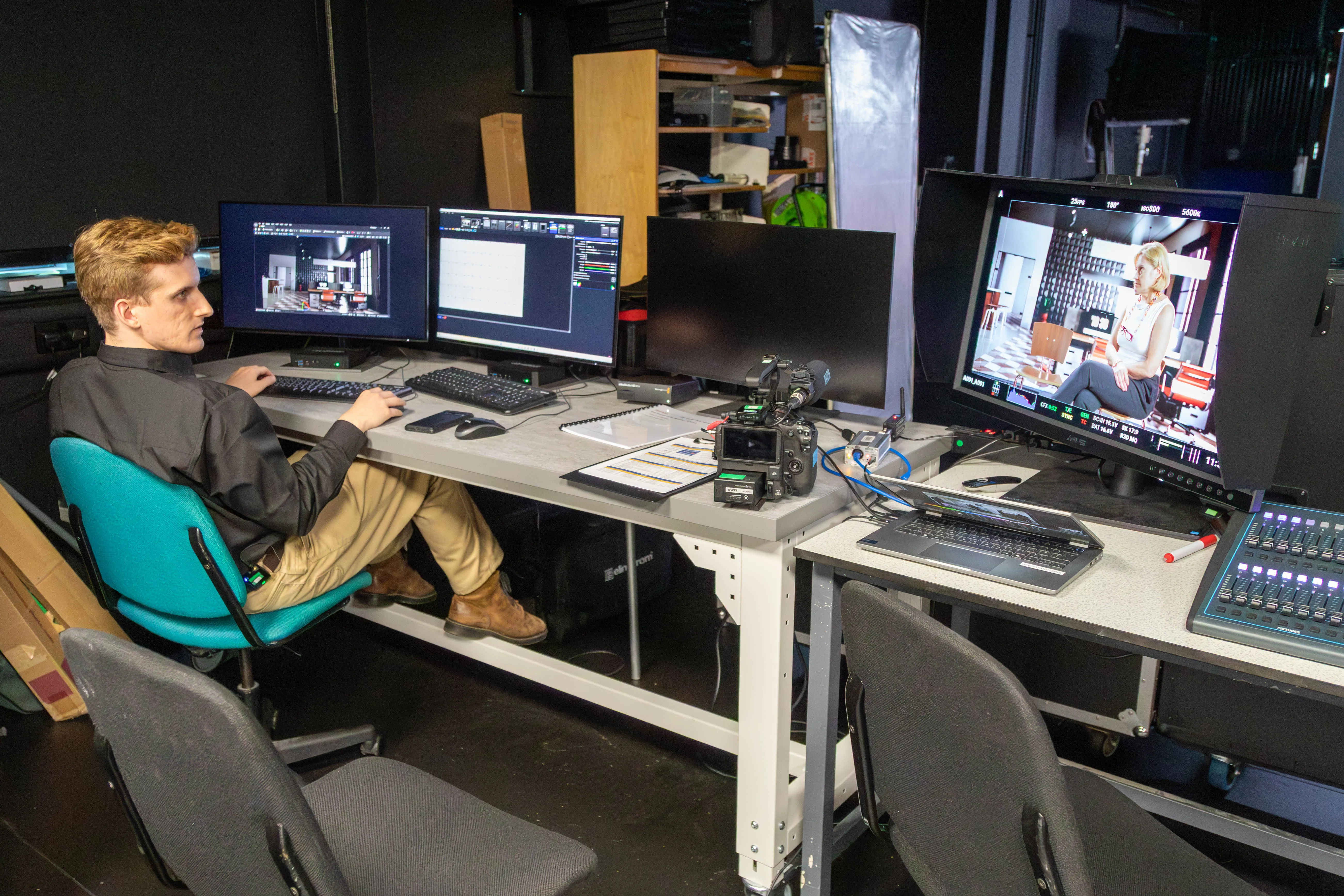 Crew operating the virtual production volume during a corporate film shoot