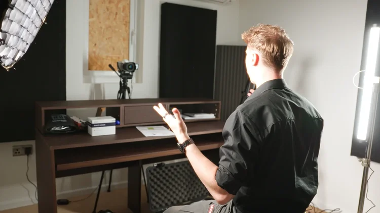 Acoustic wall baffles and bass traps treating the studio space