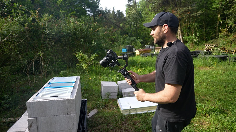 How to start beekeeping - Laurence checking the honey