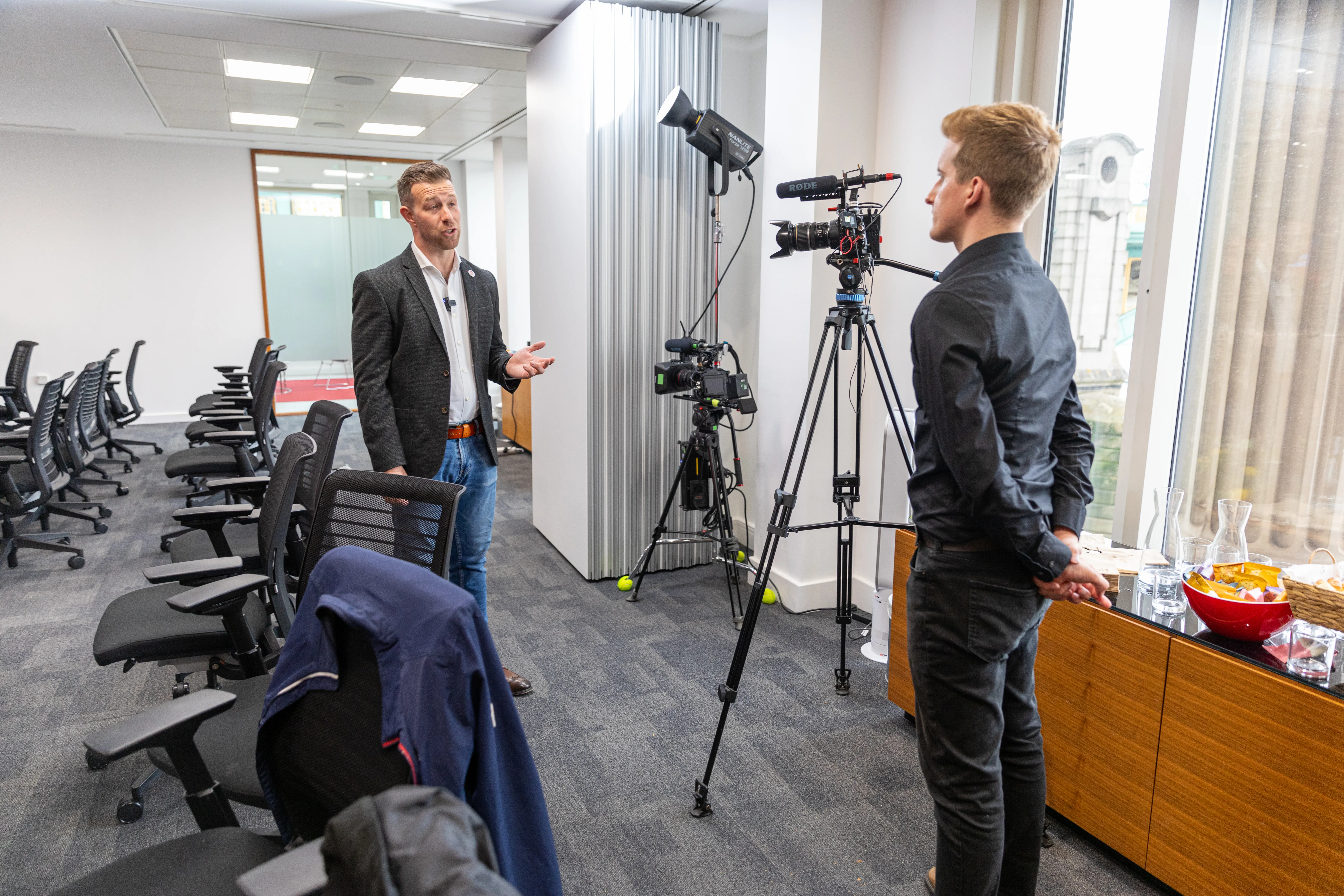 Lamplight Media camera operator capturing keynote speeches at the City of London event