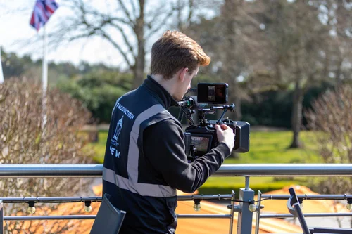 Lamplight Media film crew setting up a shot during a corporate production