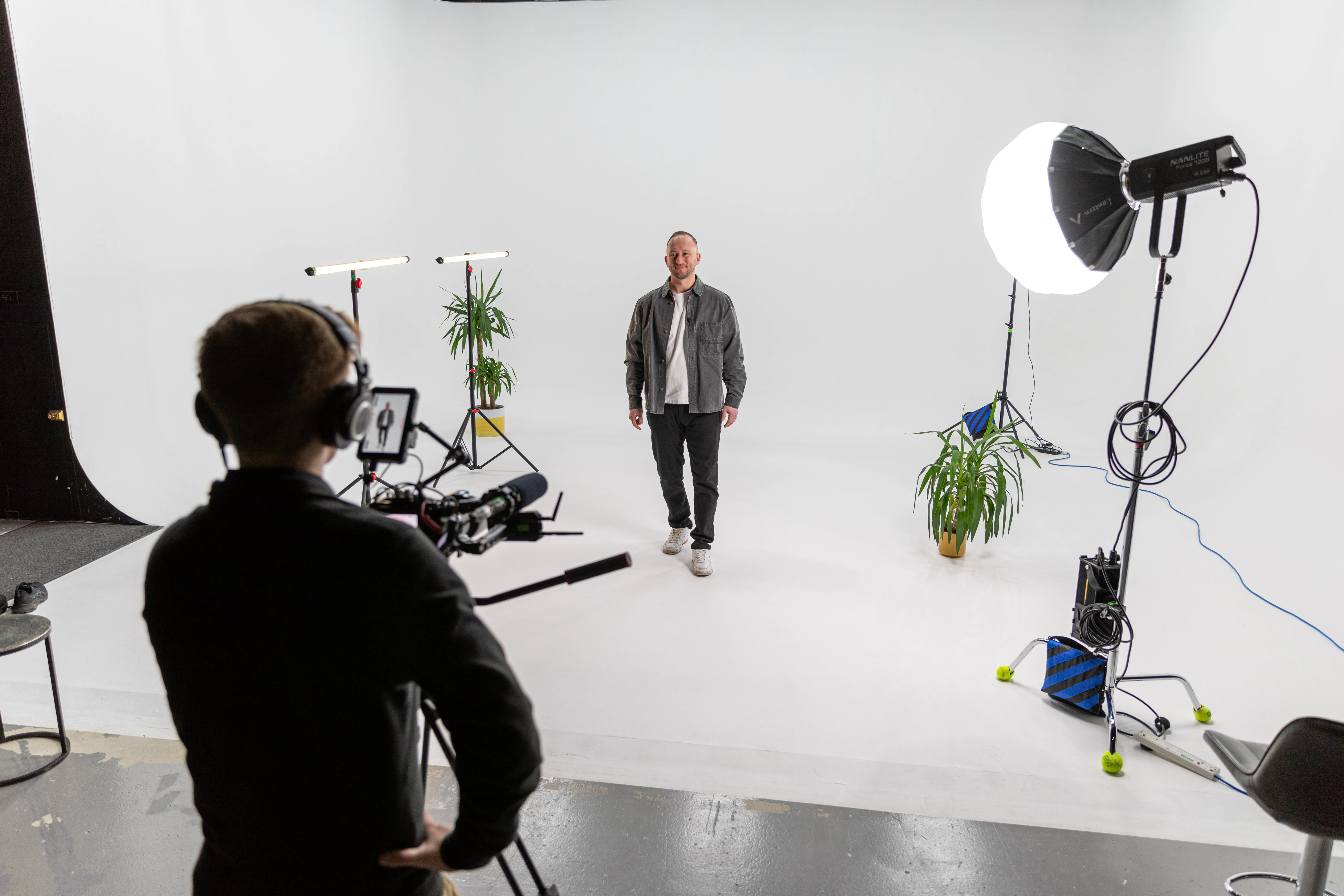 Wide view of the Lamplight Media production studio in action