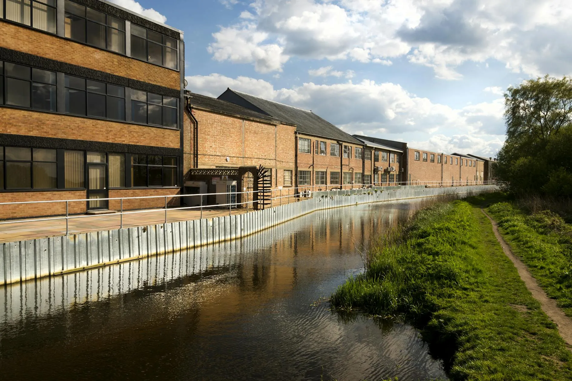 Tannery House beside the Wey navigation canal at Tannery Business Park in Send, Surrey