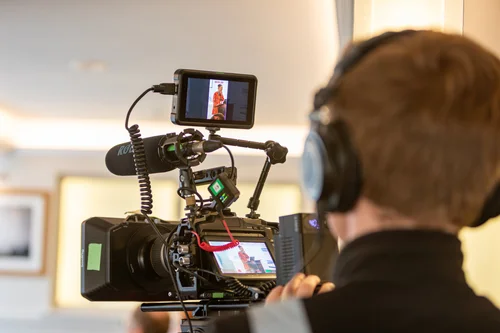 Lamplight Media film crew on location during a corporate video shoot