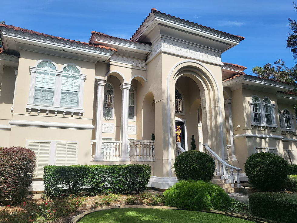Wide angle view of a beautifully painted home exterior