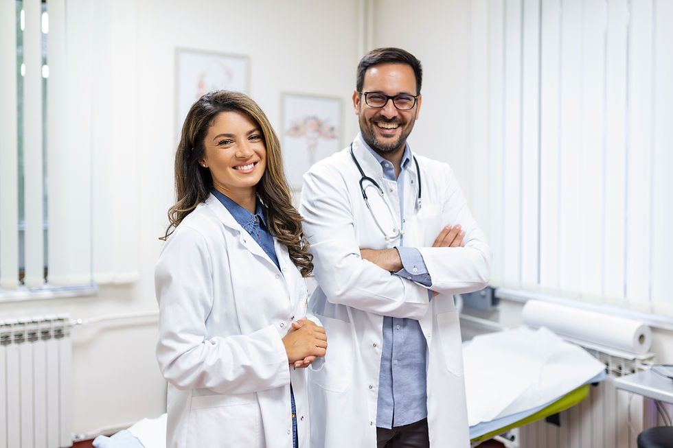 portrait-smiling-young-doctors-standing-together-portrait-medical-staff-inside-modern-hosp