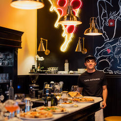 Pizza Lab interior feauting employee