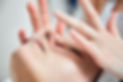 Face massage. Fingers of masseur. Nose and hands closeup. Facial skin care. Woman at beaut