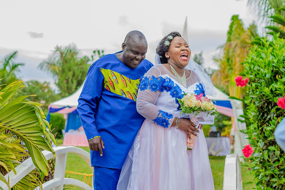 Laughing bride and groom by Truthvision Media