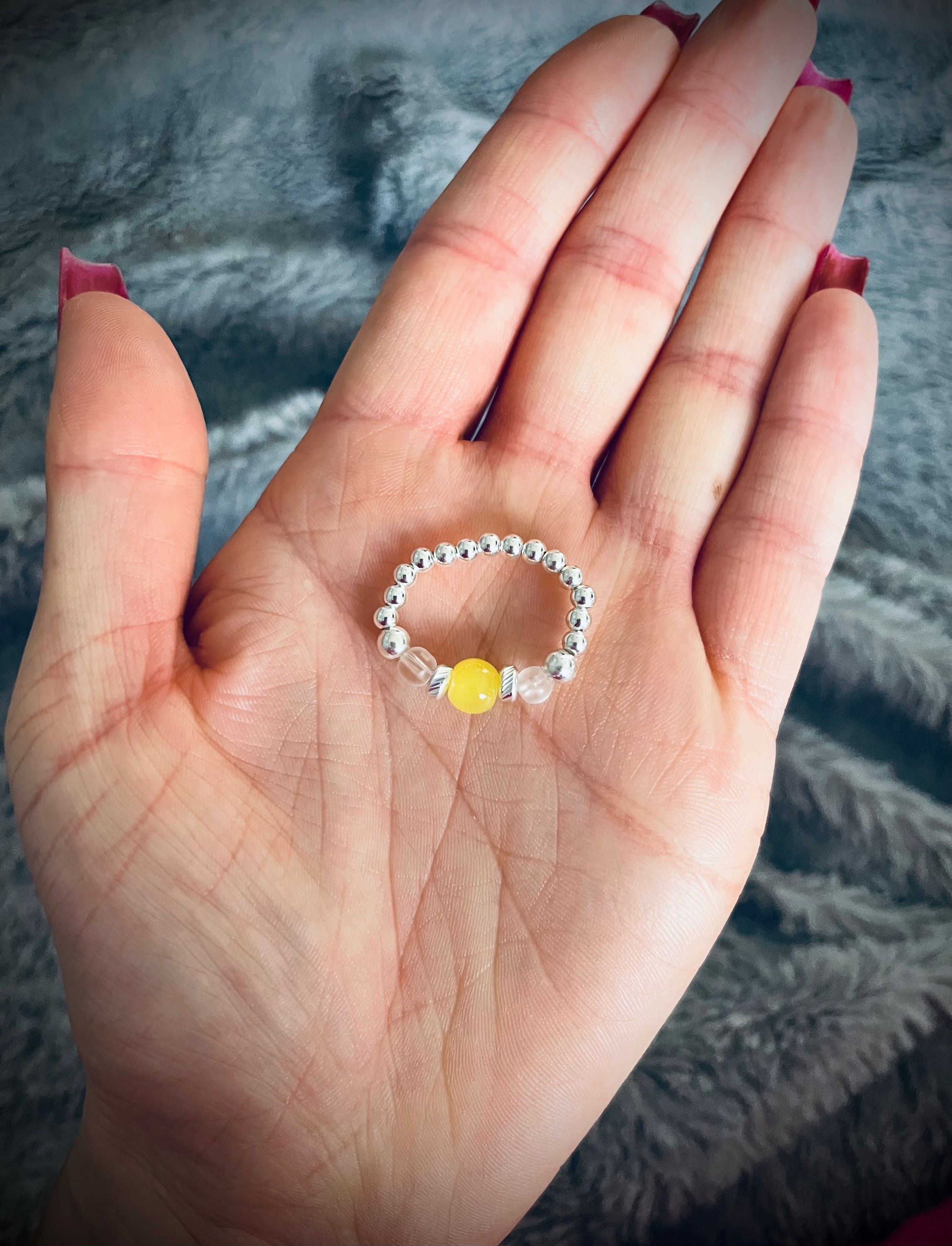 Sterling silver and yellow beaded ring.