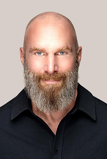 Adrian Wesley, Clinical Hypnotherapist in Vancouver BC with blue shirt and grey brown beard