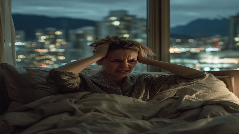 A Canadian woman sitting up in bed at 3 AM, hands on her head, not able to sleep from anxiety in Vancouver BC