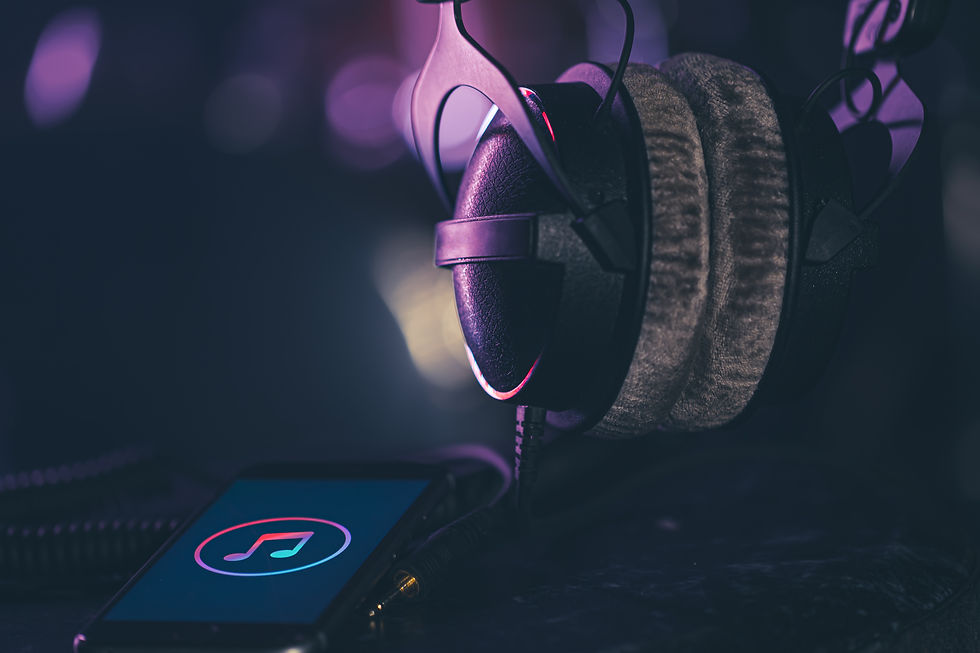 phone-with-music-icon-headphones-blurred-background-music-listening-concept-copy-space (1)