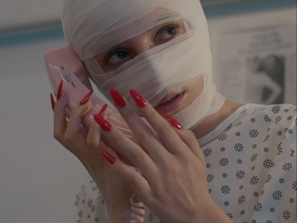Still frame, 'Two-Faced Bitch.'