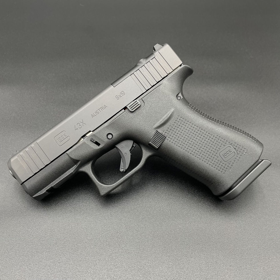 Glock 43X 9mm semi-automatic pistol side view with silver slide and black polymer grip, compact handgun on gray background