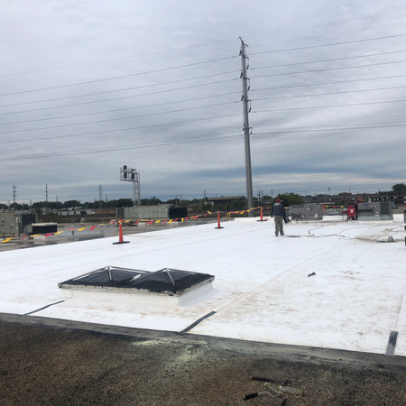 Commercial TPO roof replacement on a flat commercial building in Bedford Park, Illinois