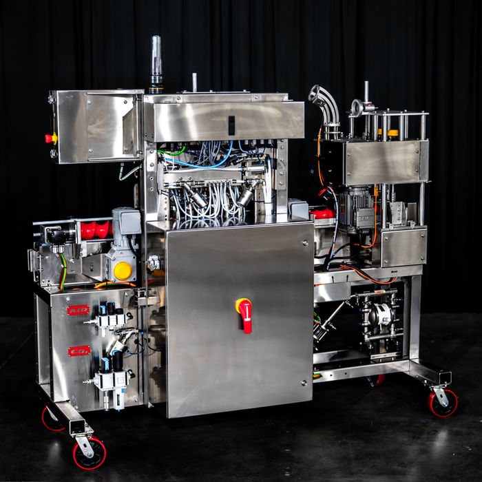 Rear mechanical overview of the CODI Manufacturing CCL-45 counter pressure canning machine illustrating 304 stainless steel sanitary construction