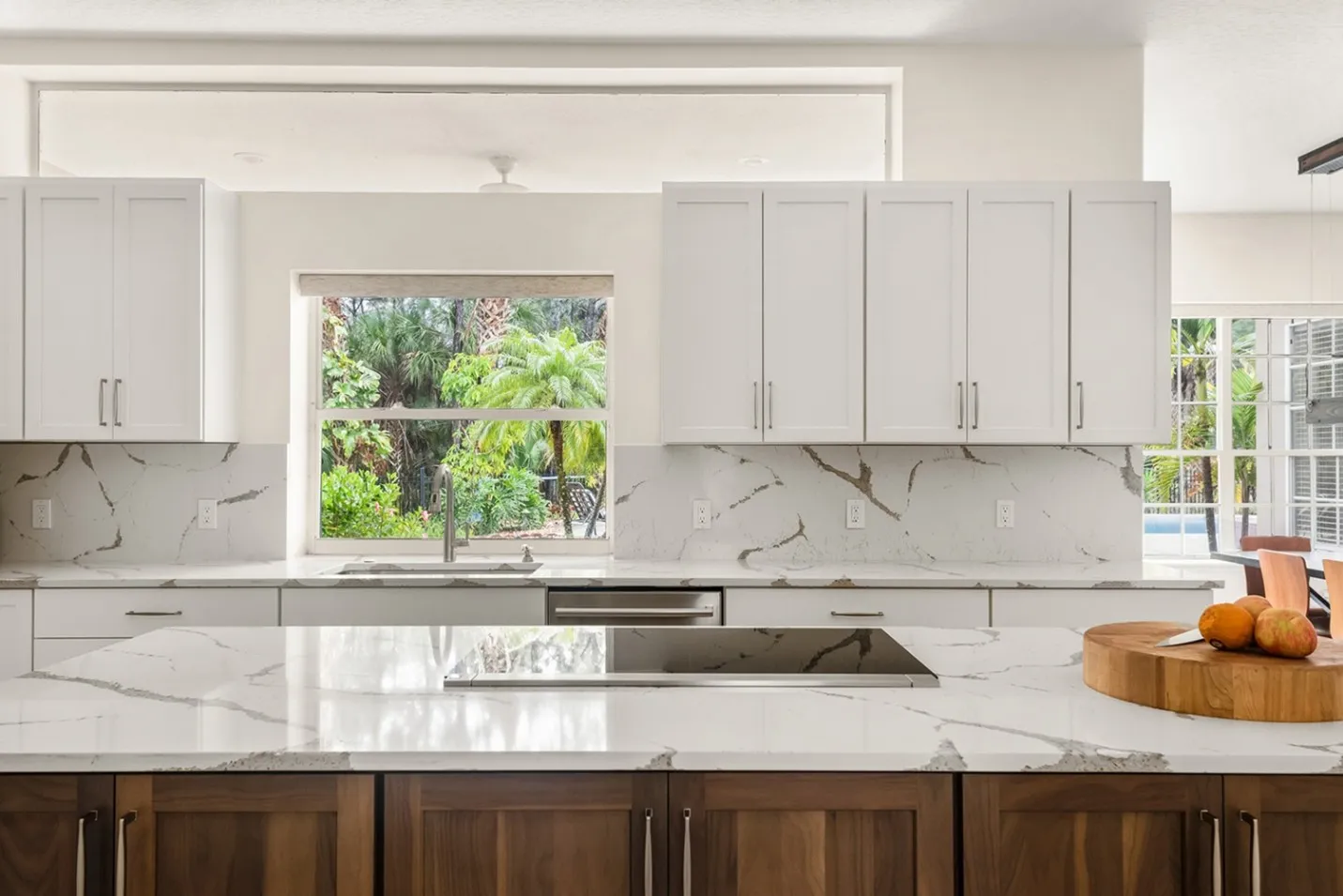 Solid Slab Backsplash. Image courtesy of: S&W Kitchens