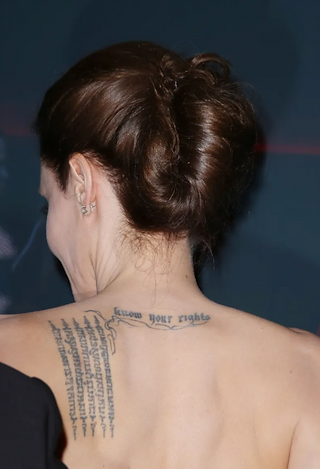 Angelina Jolie's Buddhist Pali incantation tattoo