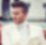 David Beckham GQ Magazine photo wearing a white blazer and turtle neck