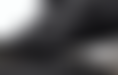 Thick black smoke engulfs tanker trucks and people on a road in Iran. A burnt sign is visible. The scene is tense and gloomy.