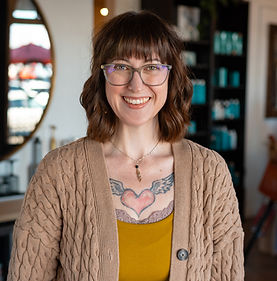 My name is Lynda and I knew from a young age I was destined to do hair. I graduated from the Studio Academy of Beauty in 2012 and began my career at Altered Ego in 2017. I offer cutting and scalp care services with a special interest in pixies and bobs. If you are looking for a soft blended cut, I'm the girl for you. When I'm not behind the chair I enjoy reading books, hiking, playing Dungeons and Dragons, and spending time with my boyfriend and spoiling our pets. Check out my Instagram @theadventuringstylist for samples of my work. I look forward to meeting you!