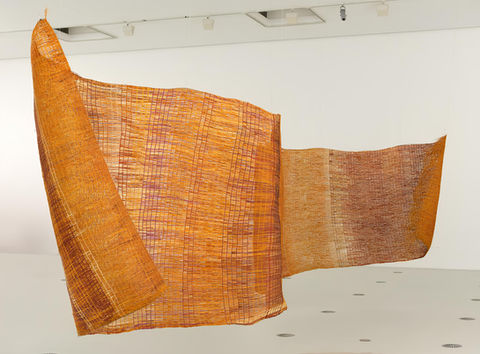 Woven orange and brown installation artwork created by First Nation's artists of Australia for the National Gallery of Victoria's 2023 Triennial