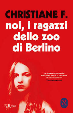 Red book cover with a woman’s portrait and Italian text: CHRISTIANE F., noi, i ragazzi dello zoo di Berlino; stark, intense mood