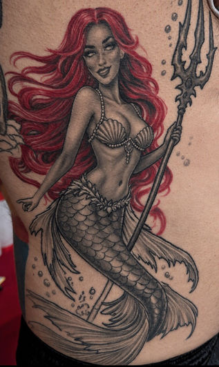 Black and grey color fusion mermaid tattoo with red hair