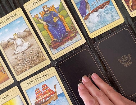 tarot cards and hand