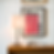 Black frame mockup for a poster with a 4x5 ratio close-up scene in minimalistic interior with warm natural light.