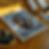 Wooden frame close-up mockup for poster 5x7 on the table with a fruit plate and packaging in natural light.