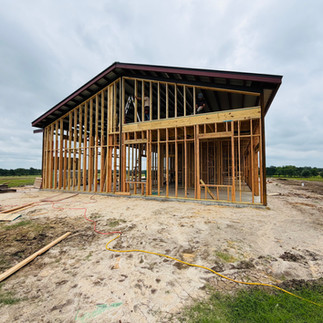 Side view of family barndominium with mother in law suite