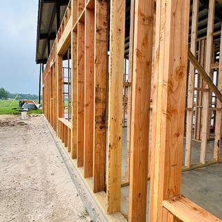 Side Framing of family barndominium with mother in law suite