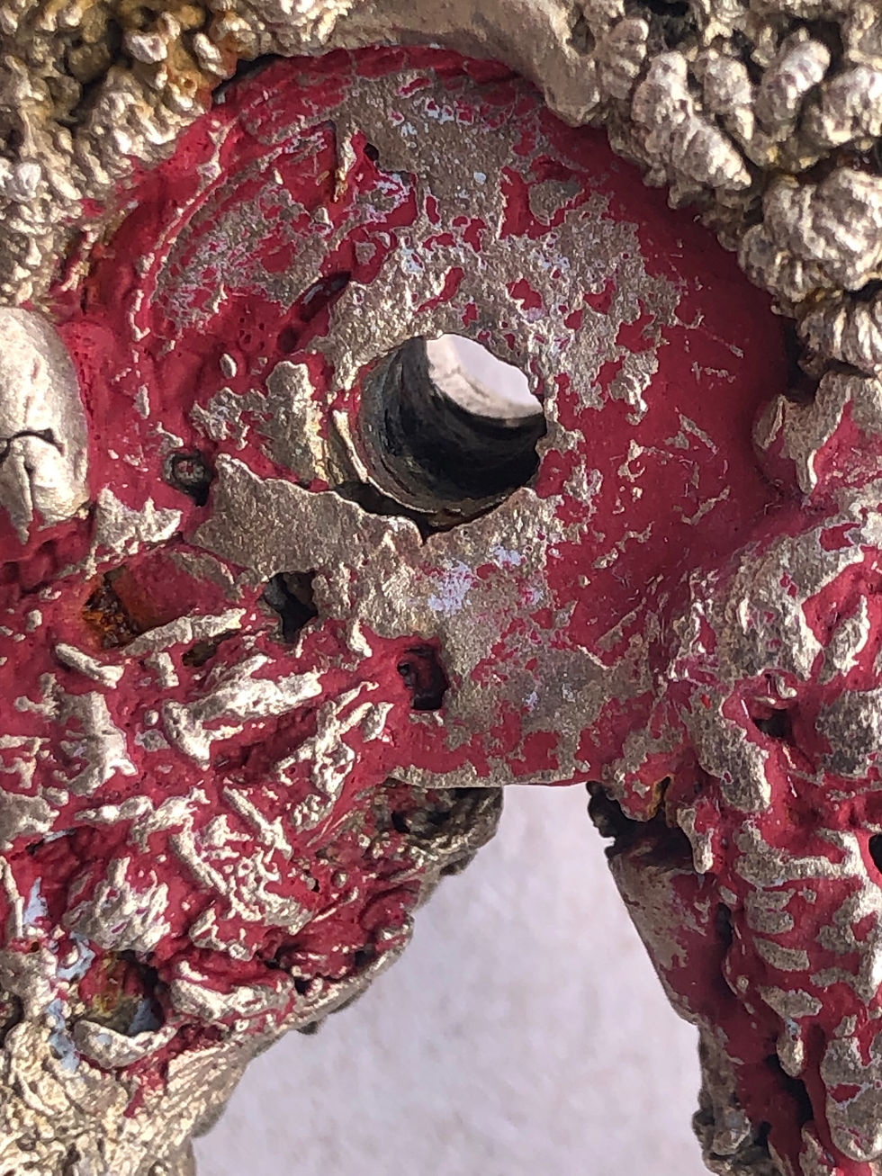 The Image shows a detail of Cramp the Joints: Ian's Tool where paint has been applied and then scratched away