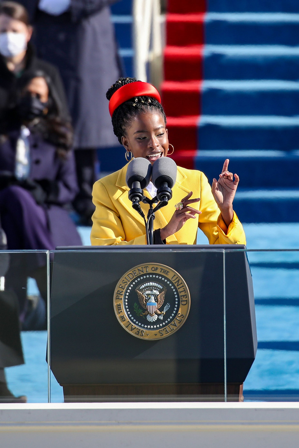 Amanda Gorman was the poet who read on Biden's Presidential Inauguration. She is the current United States Poet Laureate. In 2017, she became the United States of America's first National Youth Poet Laureate. She is also an activist from Los Angeles, California. Gorman's work focuses on issues of oppression, feminism, race, and marginalization, as well as the African diaspora