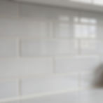 Light gray subway tile backsplash