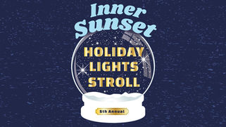 A snow globe that has the words Holiday Lights Stroll inside it 