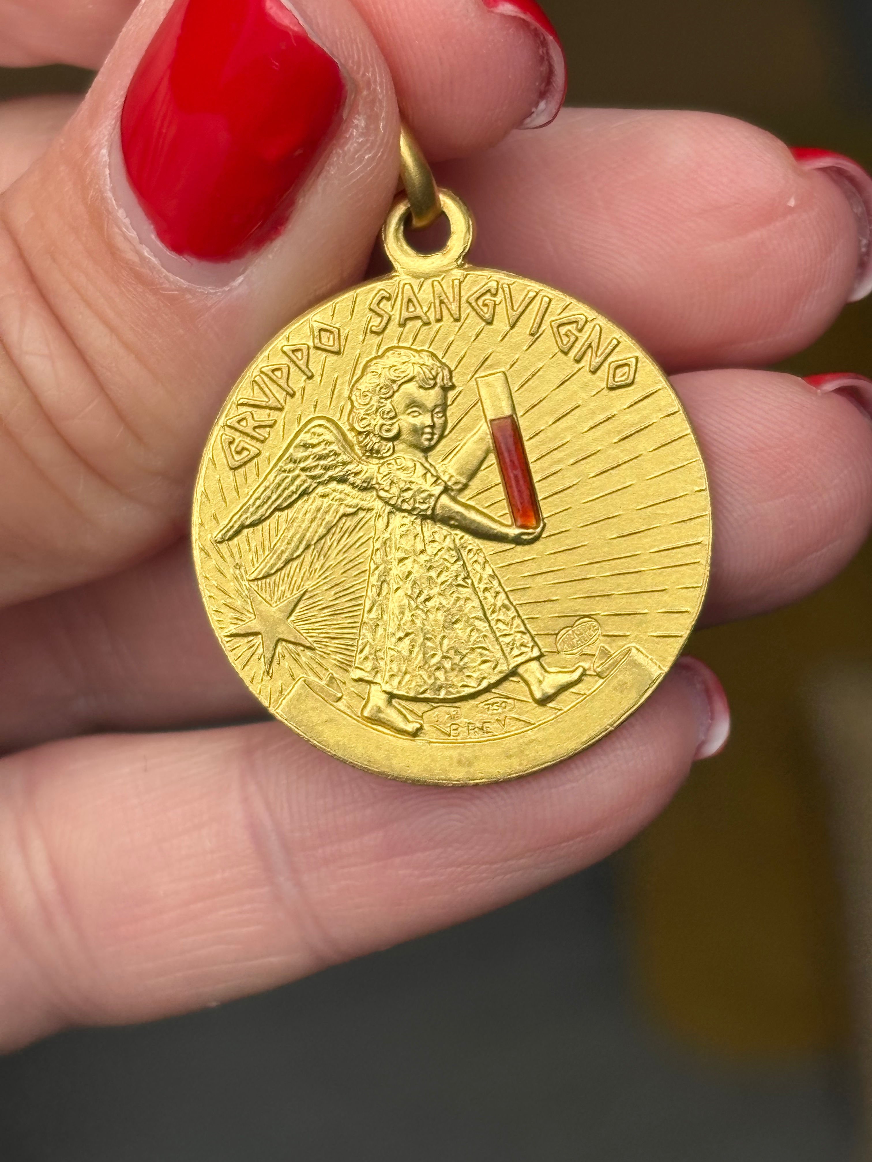 Vintage 18ct UnoAErra guardian angel pendant
