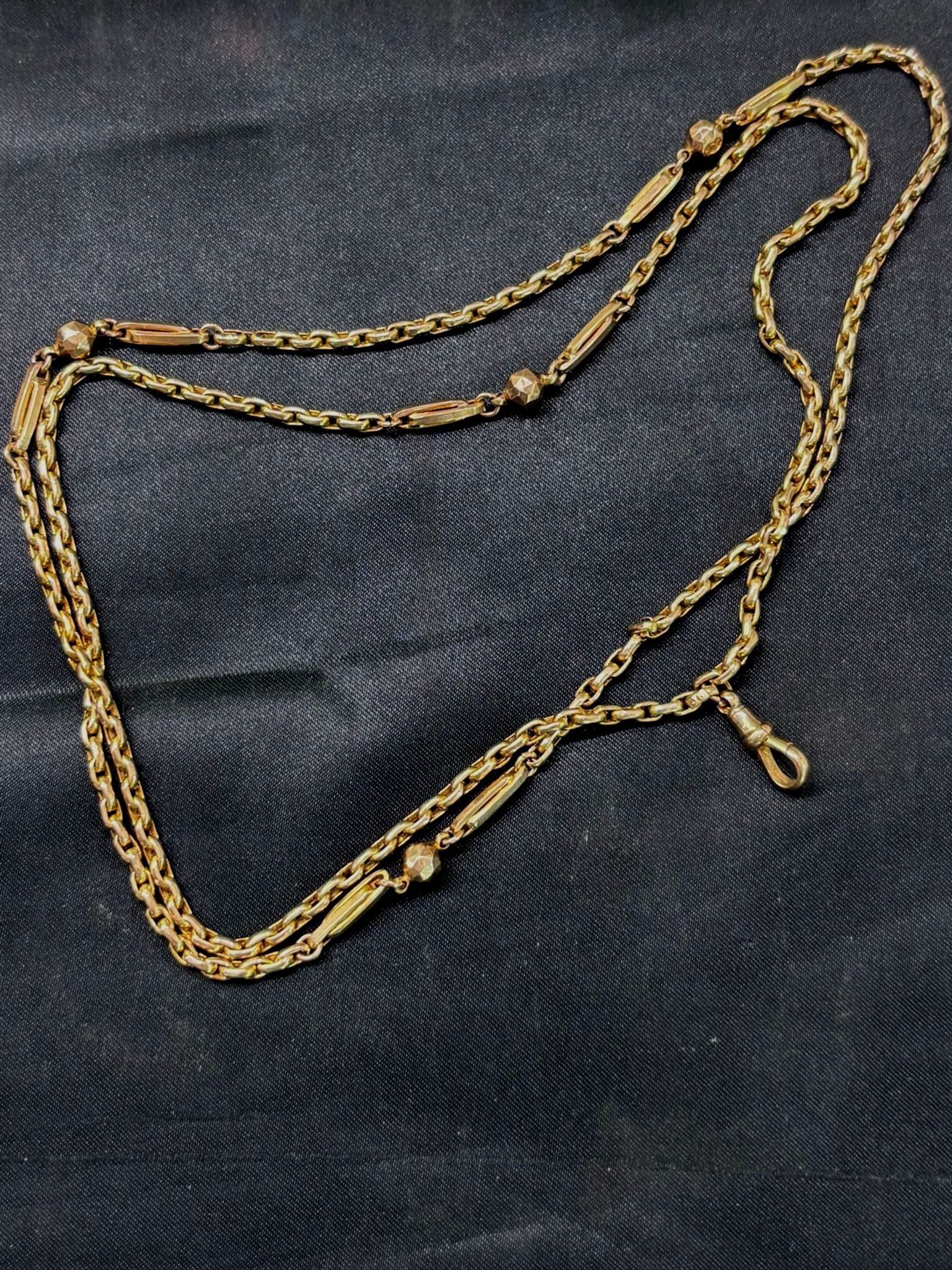 Antique 9ct yellow guard chain with double trombone and ball links and dog clip 