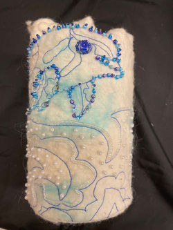 Wet felted and embellished