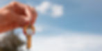 hand-holding-keys-outdoors_edited.jpg