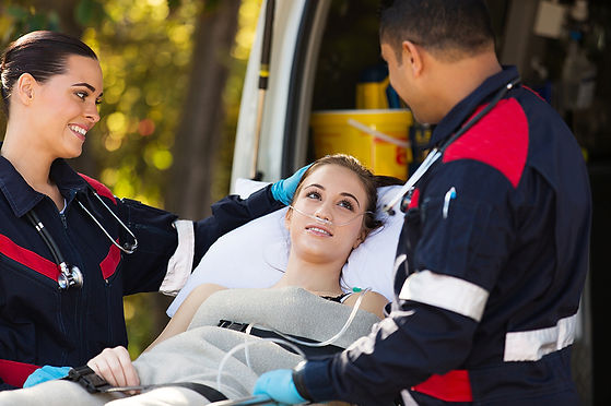 Patient-with-Paramedics.jpg