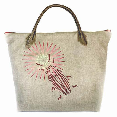 LISA JONES IS ALL LOVE AND CREATES ART IN A TOTE