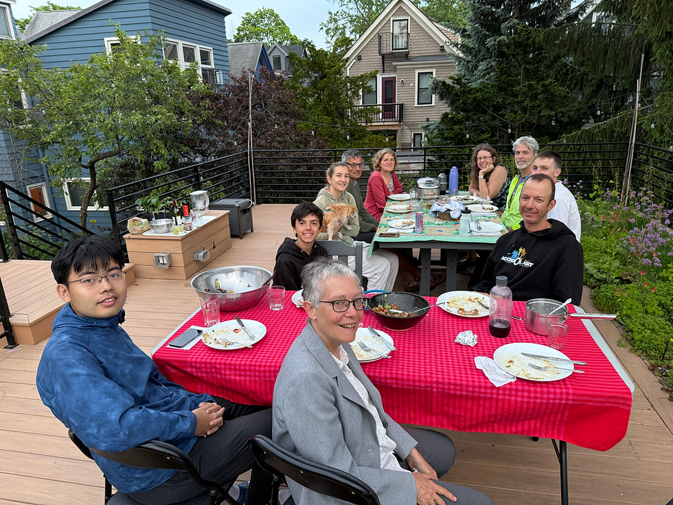 Staff, volunteers and friends at a fundraising dinner at Navigation Games Headquarters
