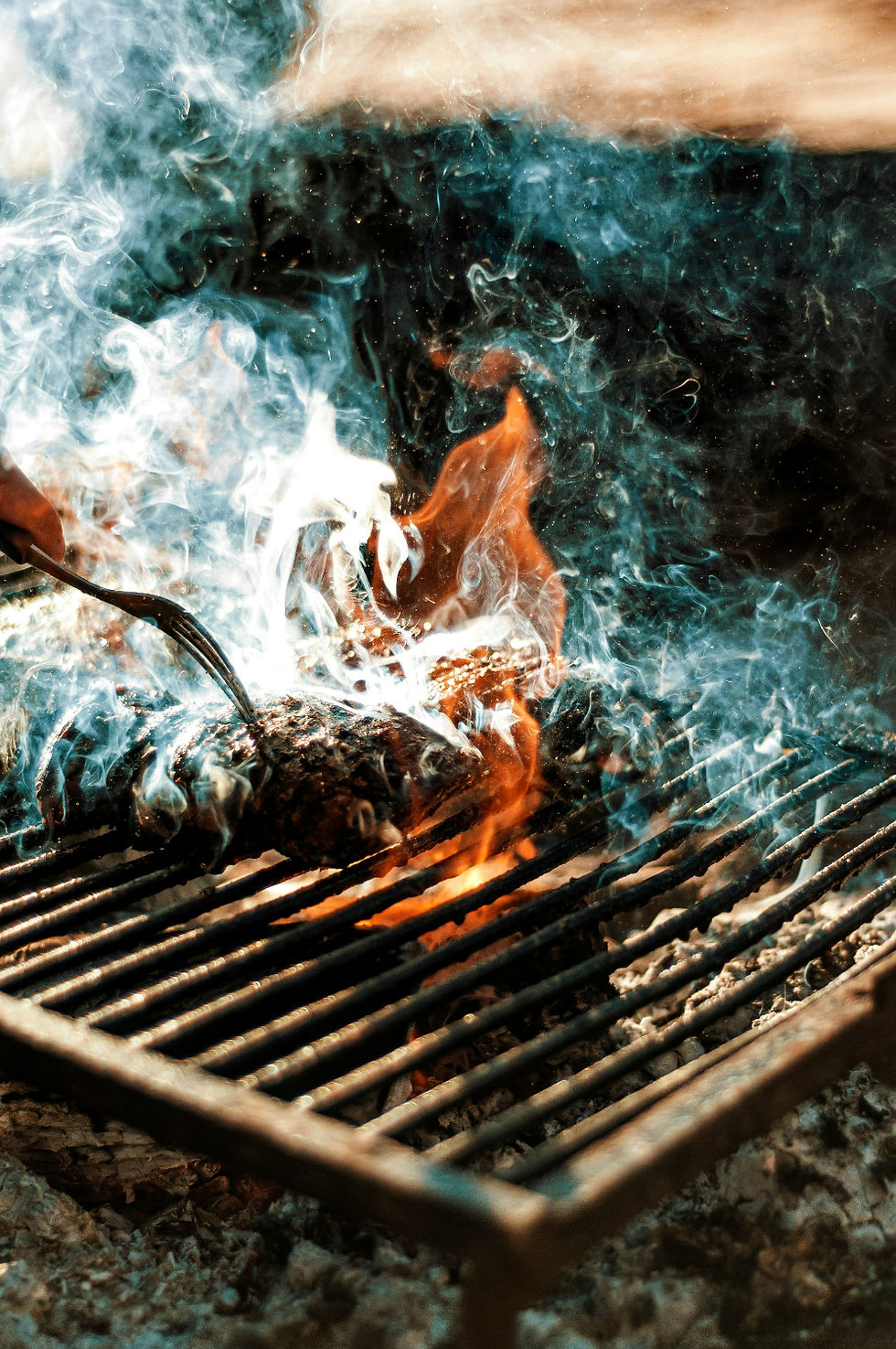 Typical Asado. Uruguays national dish. Grilling high-quality beef over a wood fire