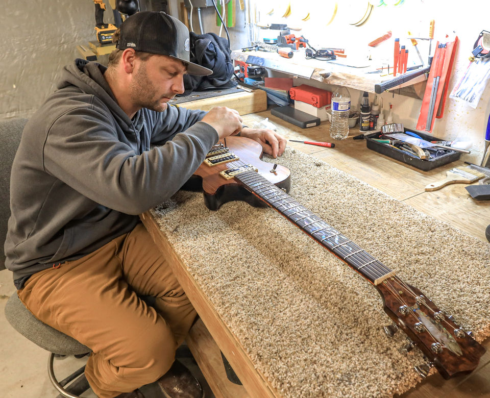 Shane making a custom guitar 
