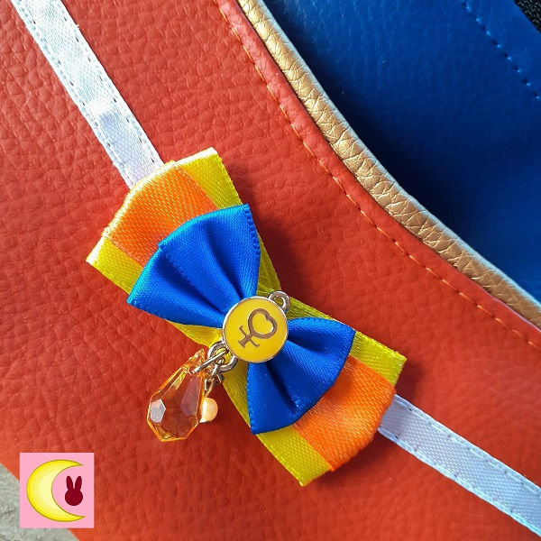 Thumbnail: zoom sur le noeud ribbon charm